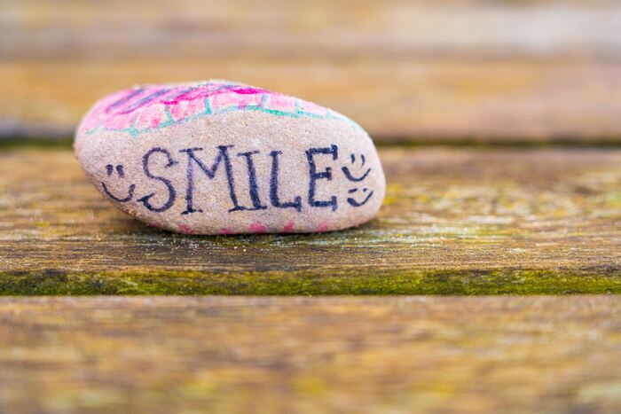 Smile written on a rock